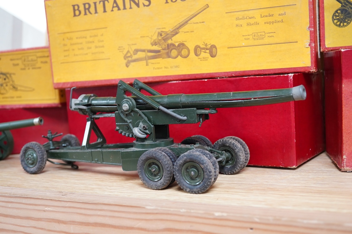 Three boxed Britains military field guns; a 4.7” Naval Gun, mounted for field service (No.1264), an 18” Howitzer (No.2107), and a 155mm Gun (No.2064), all with some accessories and shells missing